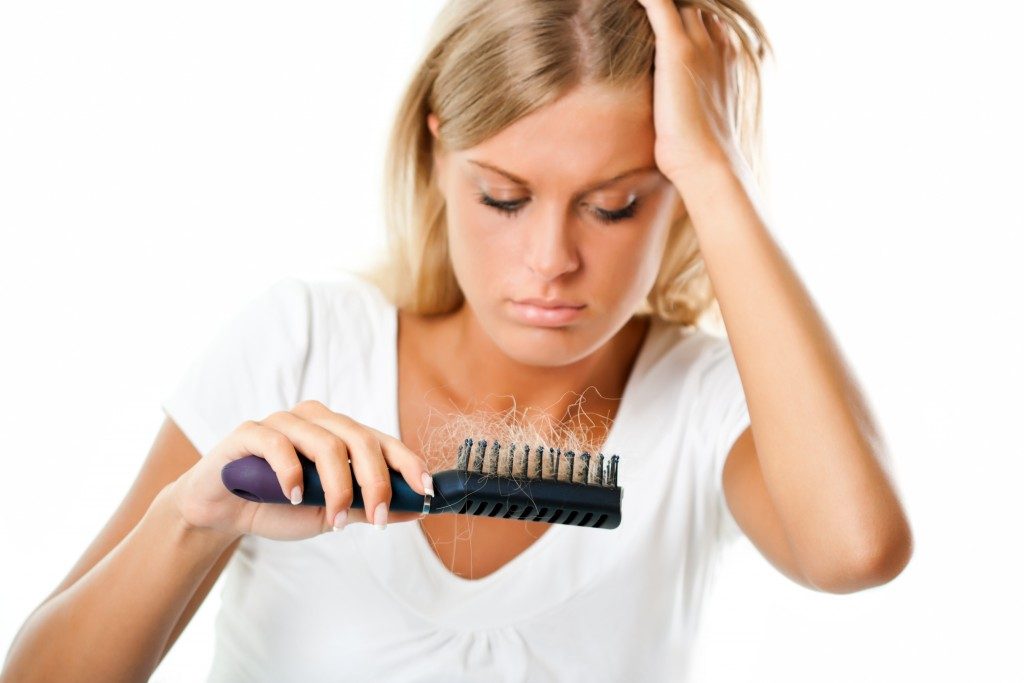 Woman worried about hair loss