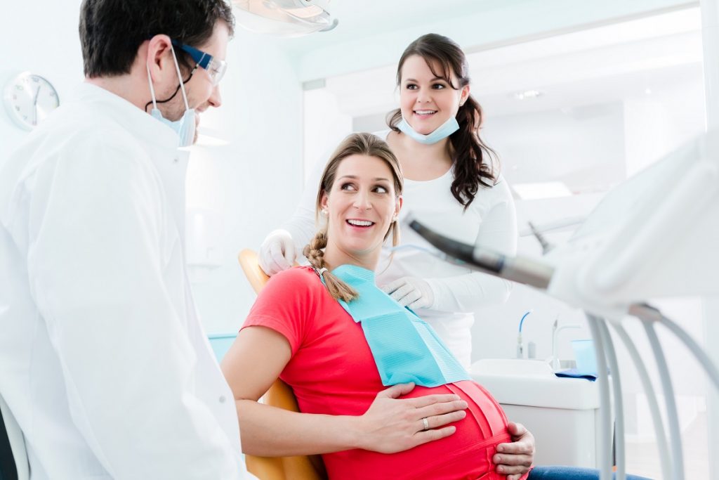 Pregnant patient with her dentist