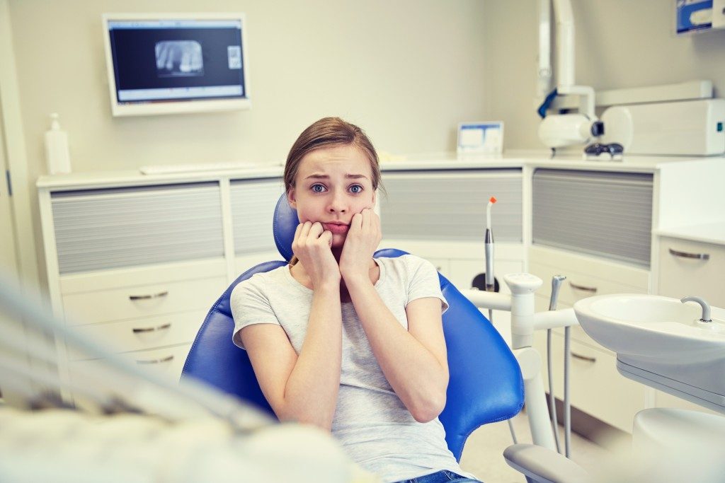 Woman scared dental appointment