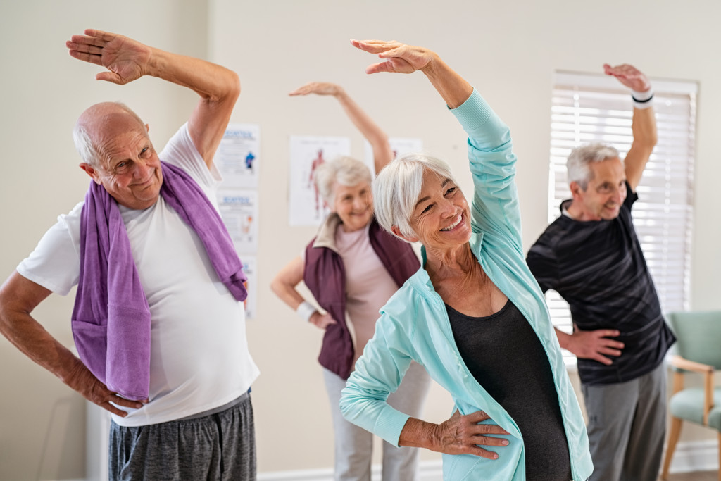 a group of elderly people working out