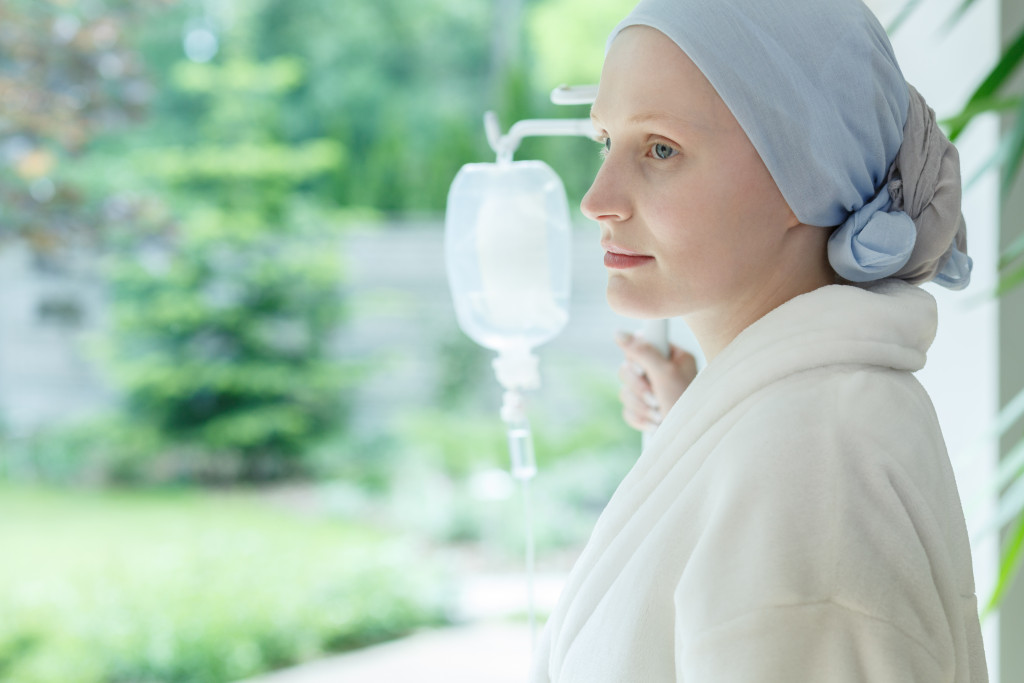 A woman with cancer being treated in a facillity