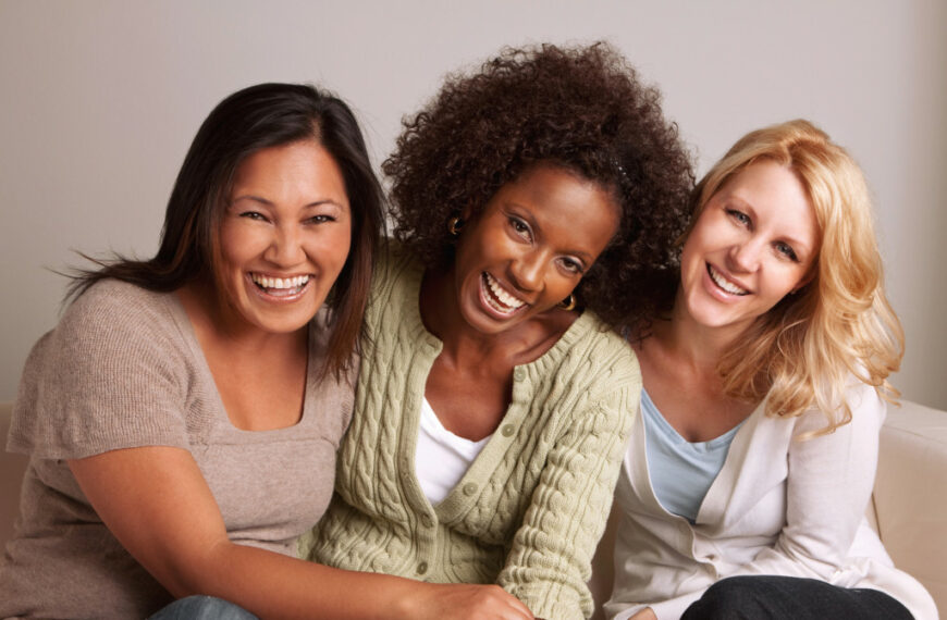 Three women from different ethnicities in a photo