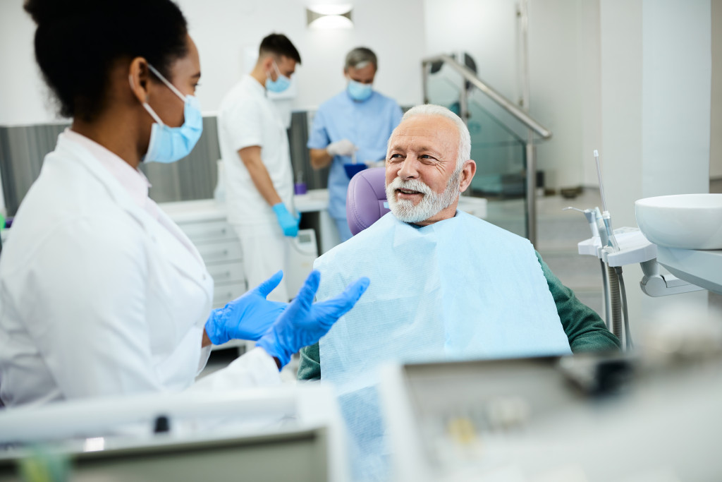 An aging person getting dental checkup